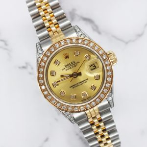 Ladies Rolex Datejust 69173 with Champagne Diamond Dial, Bezel and Shoulders.