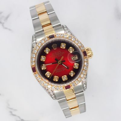 Ladies Rolex Datejust in Steel & Gold with Red Diamond Dial, Bezel & Shoulders.