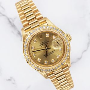 Mint Ladies Solid 18ct Yellow Gold Rolex Datejust with Diamond Dial & Bezel.